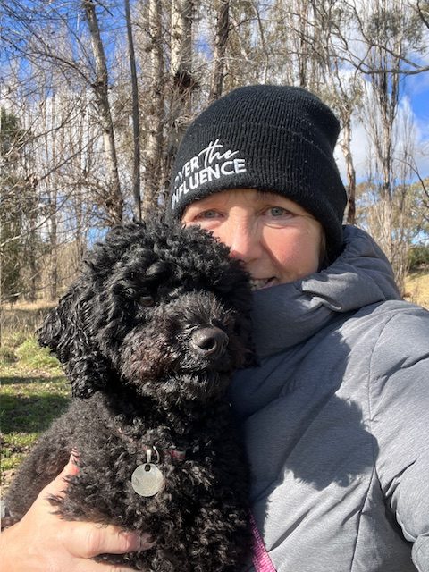 Maisie poddle and Seana Smith dog sniffing on walks story